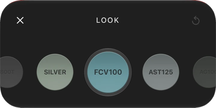 FilmTexture Puts Ten Film Looks in the iPhone Viewfinder 4 FilmTexture camera Look panel showing a strip of films applied live in the viewfinder