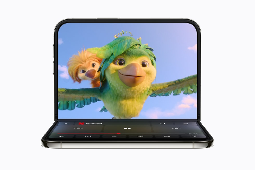 Netflix on a partially folded iPhone Duo playing an animated show on the inner display