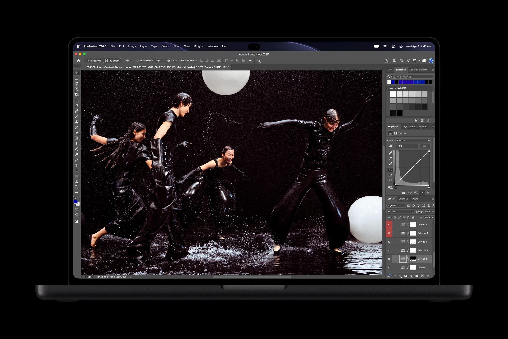 MacBook Pro with PROLED XDR Display showing the Photoshop app on the tandem OLED screen